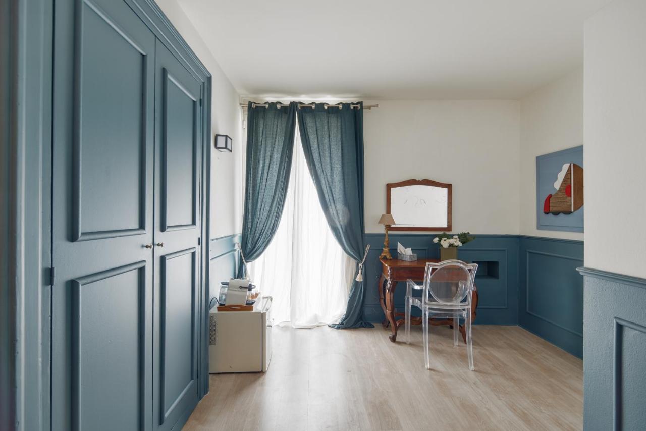 L' Hotellerie Easy Suites Palermo Bagian luar foto
