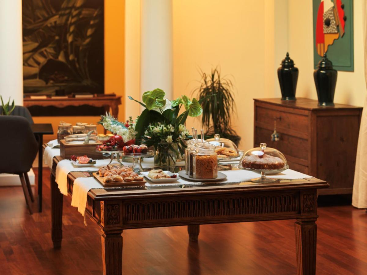 L' Hotellerie Easy Suites Palermo Bagian luar foto
