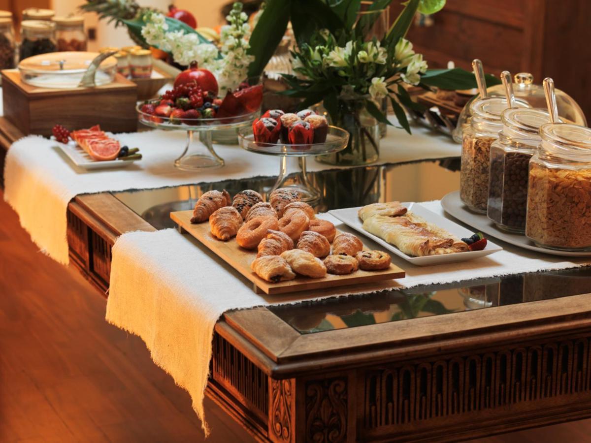 L' Hotellerie Easy Suites Palermo Bagian luar foto