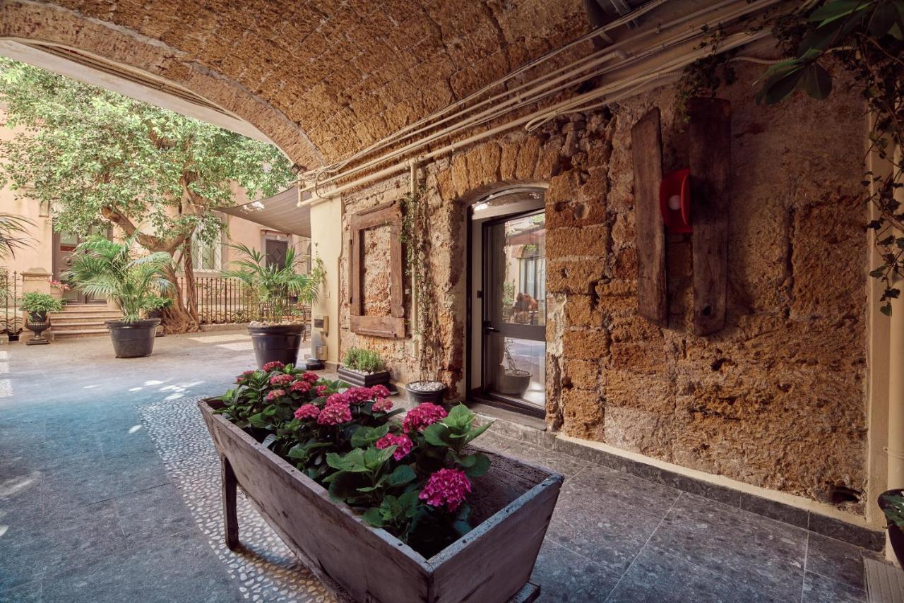 L' Hotellerie Easy Suites Palermo Bagian luar foto
